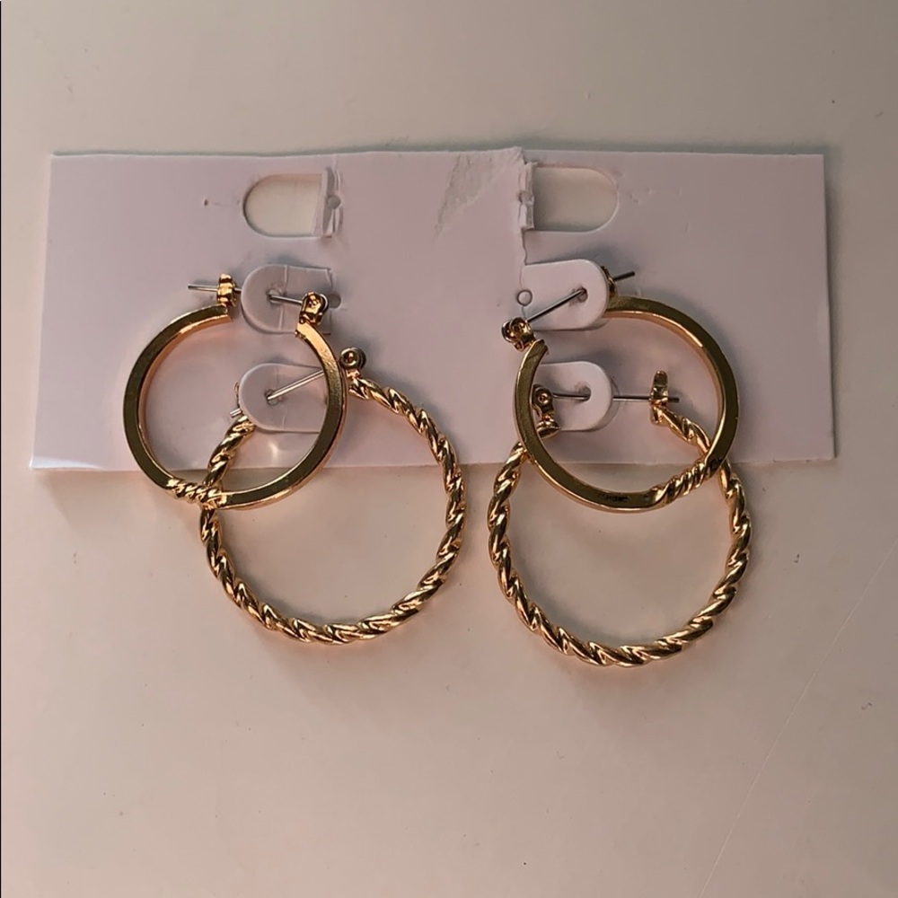 two pairs of gold earrings